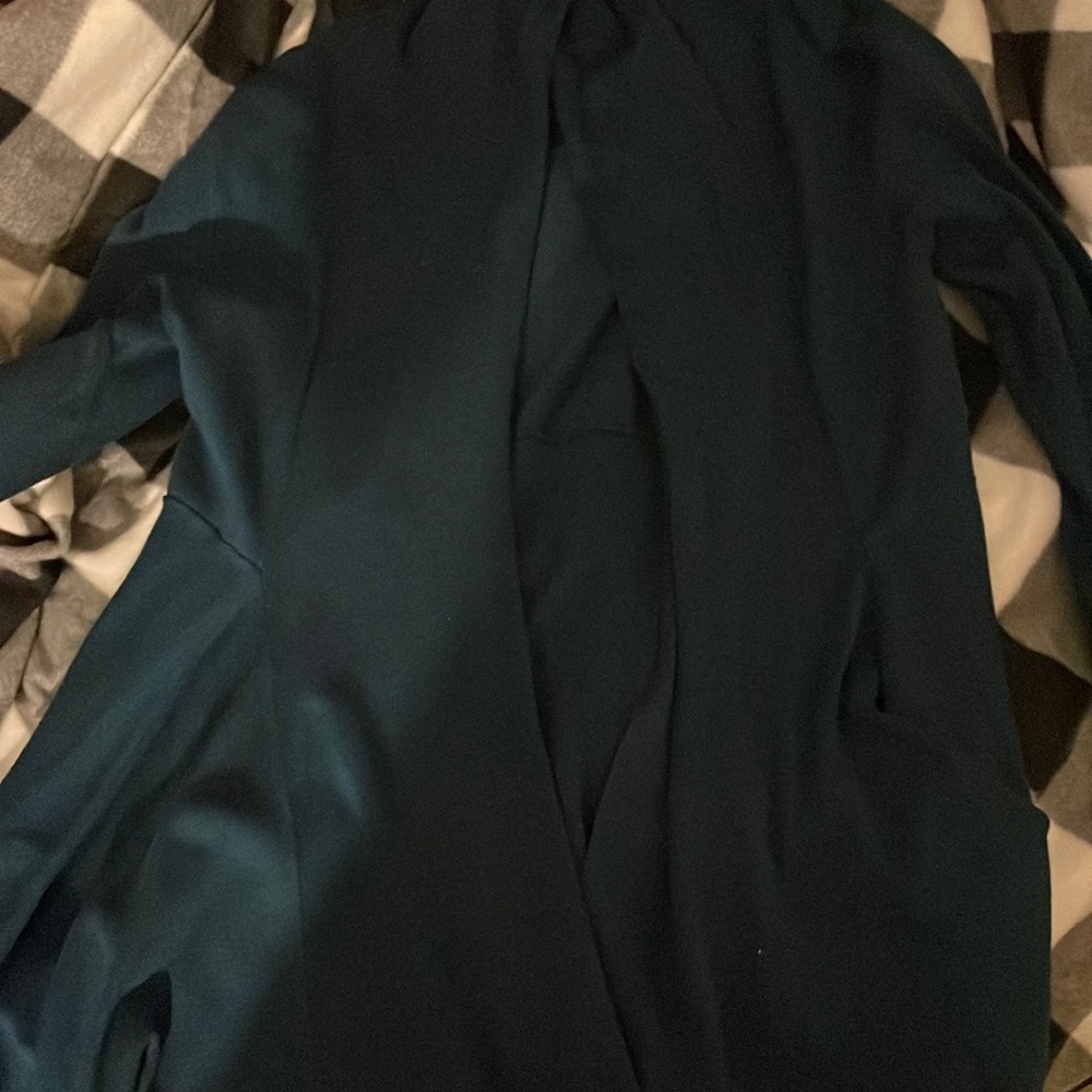 Maurice’s teal cardigan